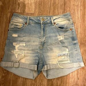 Light blue ripped jean shorts